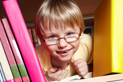 kid in bookcase