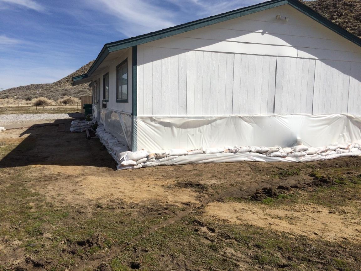 sandbags against a house